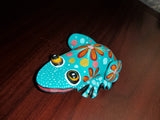 Colorful wood carving frogs