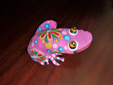 Colorful wood carving frogs