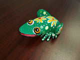 Colorful wood carving frogs