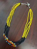 Glass beaded black / yellow