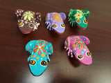 Colorful wood carving frogs